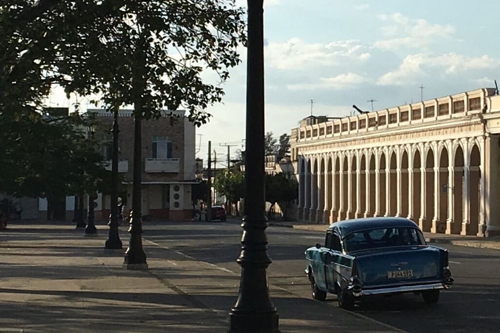 The beautiful Jose Marti Parque with the classic vintage car in front, one of the 10 things to do in Cienfuegos