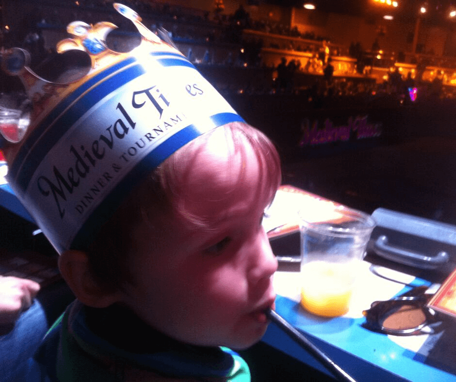 Lukas watching the tournment while wearing his crown