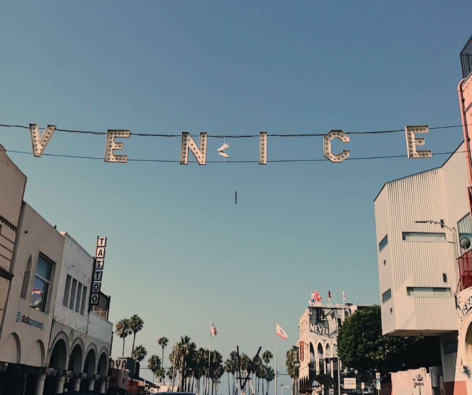 The Venice sign welcomes everyone on a clear blue sky day