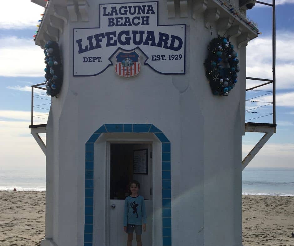 Lukas standing outside the Laguna Beach lifeguard tower
