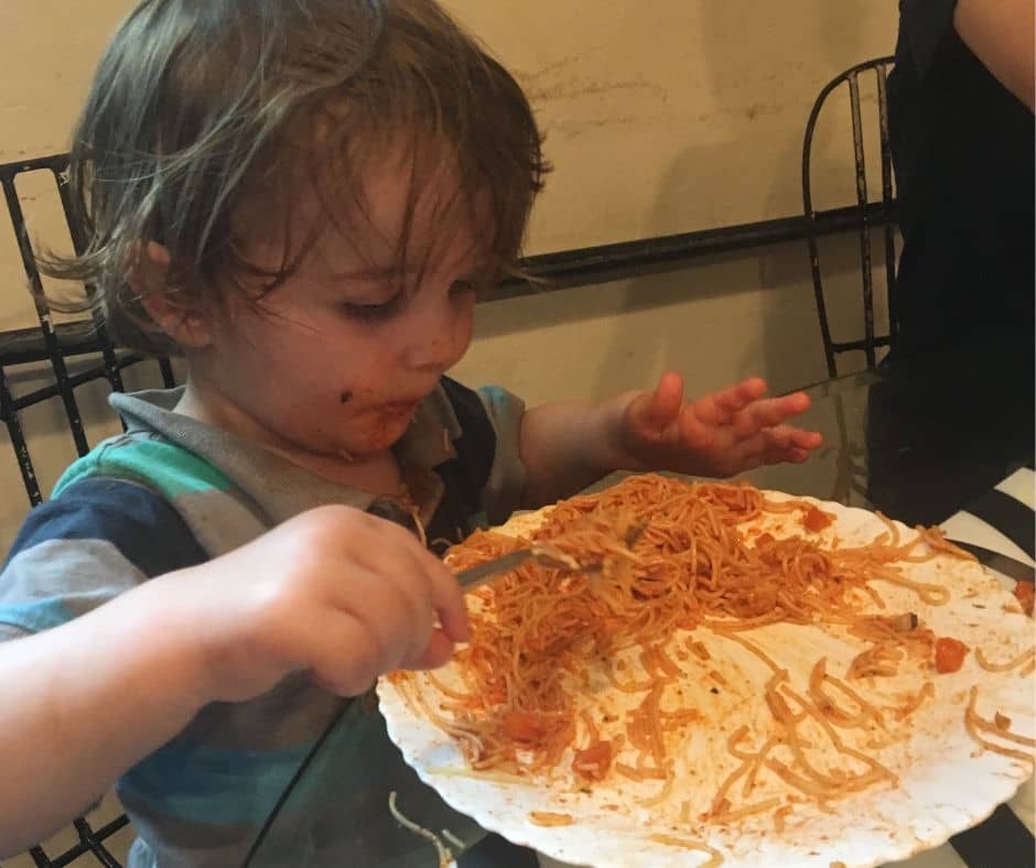 Sawyer eating pasta