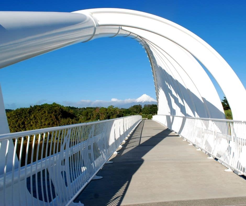 Te Rewa Rewa Bridge with Mount Taranaki framed in the background. This is a must activity to do in New Plymouth