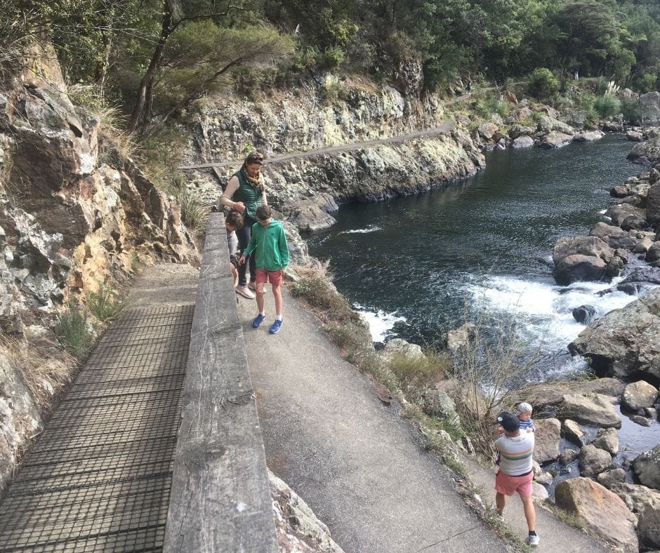 The family walking along the Rail Tunnel Loop next to the Ohinemuri river