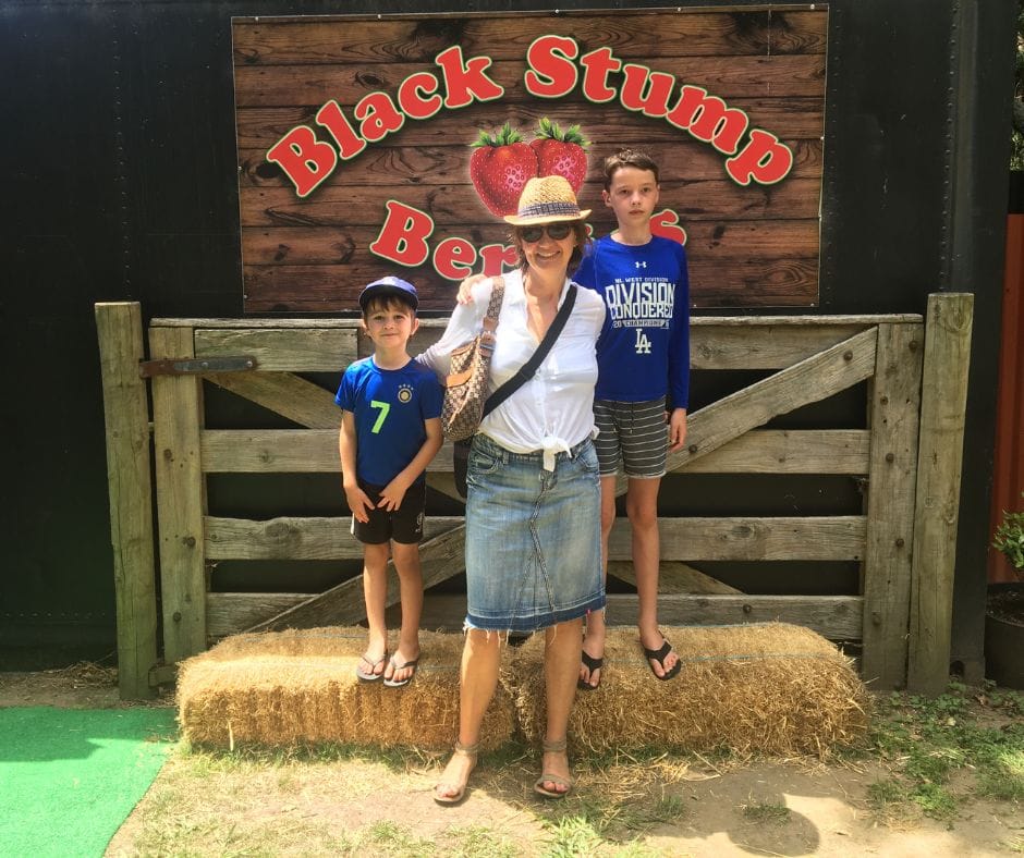 Family photo with the Black Stump Berries sign