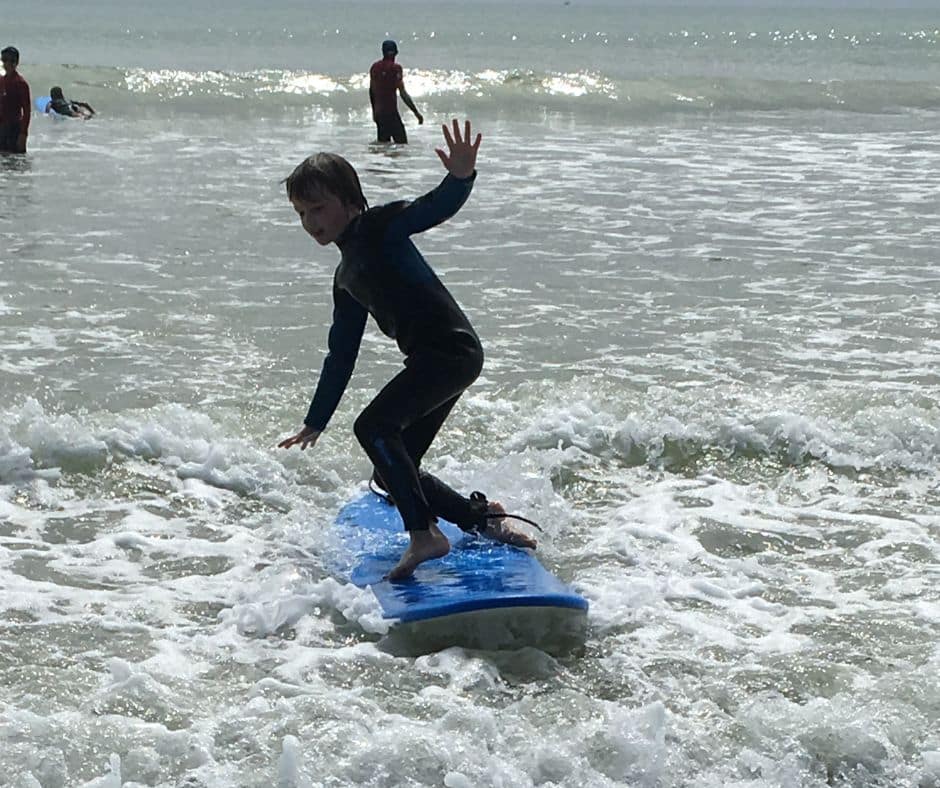 Surf lessons is certainly one thing to do in Mount Maunganui. Here Lukas starts on his board