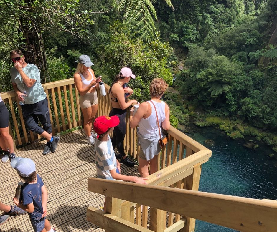 The platform at the end of the Te Harikoa track. The family are looking down and around Ōmanawa Falls